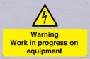 warning-work-in-progress-on-equipmentwith-electrical-hazard-symbol~